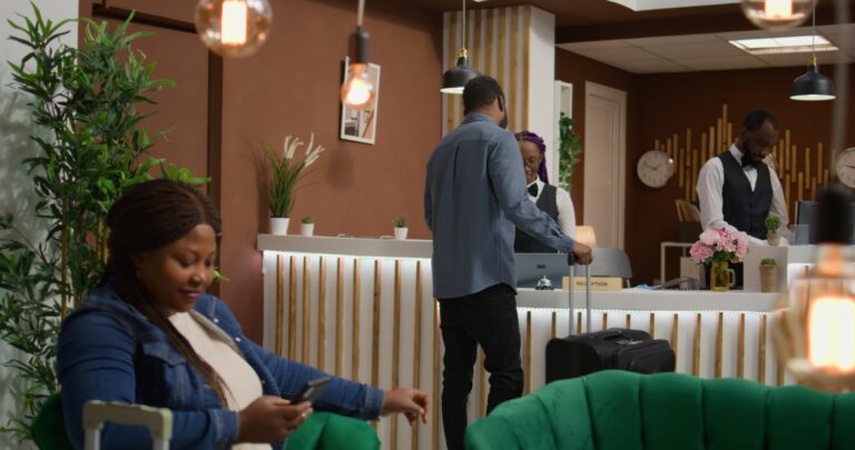 Guest travelling with luggage at hotel